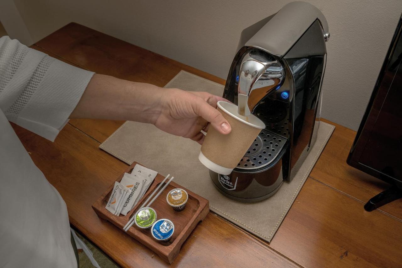 Wyndham Puerto Varas Pettra Exteriör bild A Nespresso coffee machine